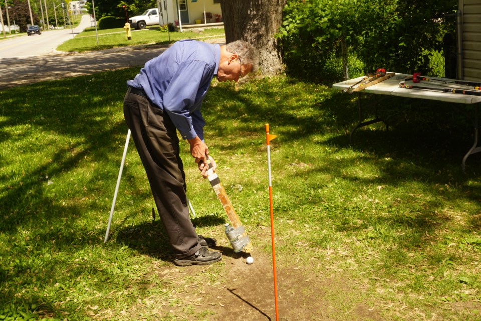 Donavon Quackenbush demonstrates his putting training aid system to improve accuracy for individuals who are having difficulty sinking golf putts on the golf course.                               
