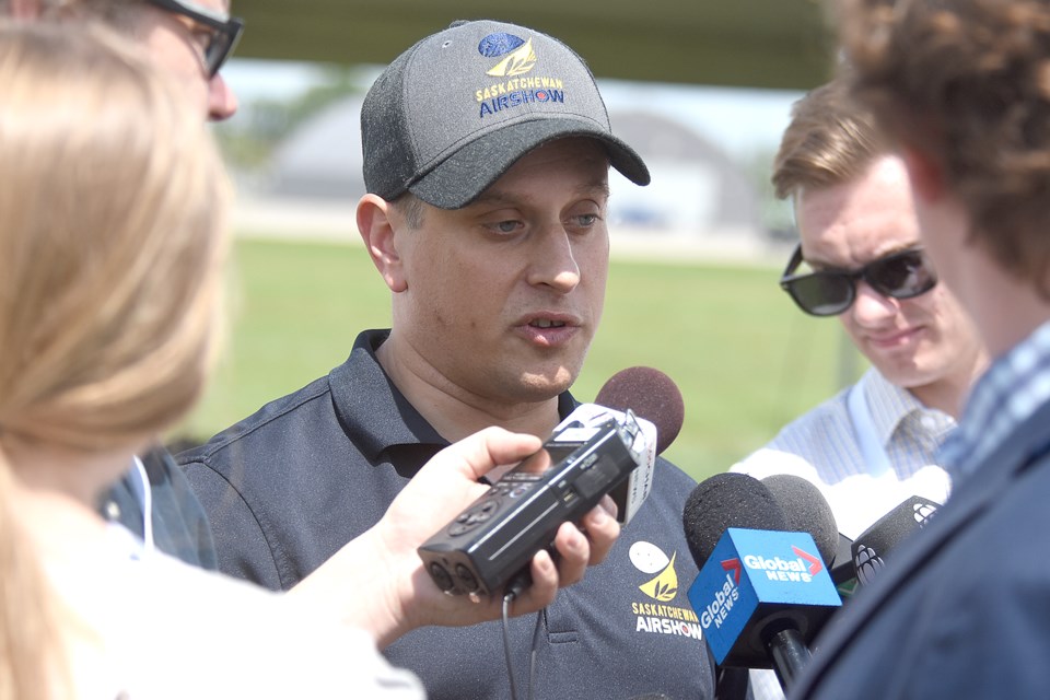 Maj. Regan Wickett, director of the 2019 Saskatchewan Air Show, speaks to the media as final set up took place on Thursday afternoon.