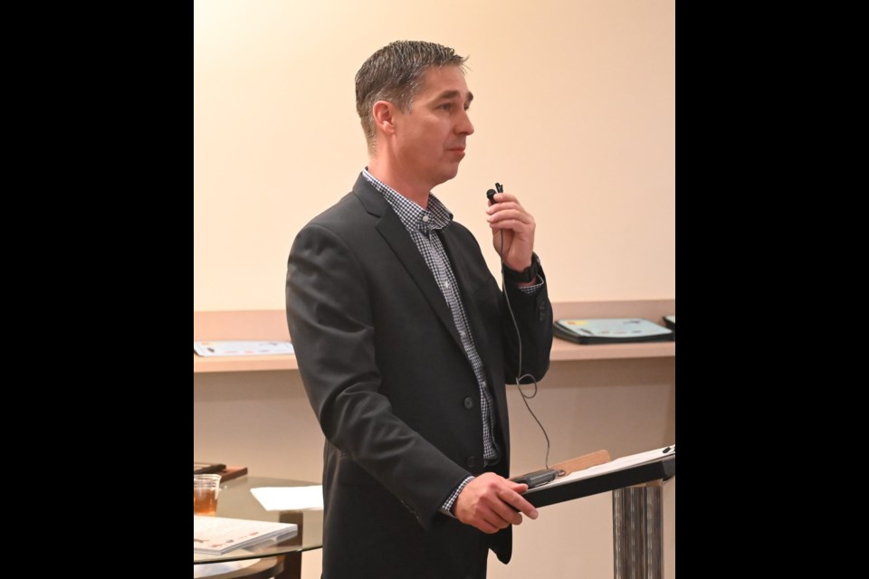 Col. Jonathan Bouchard, base commander at 15 Wing, addresses attendees where he announces the Snowbirds' 50th reunion is to be held next weekend. The reunion will draw about 600 to the city. Photo by MJ Independent