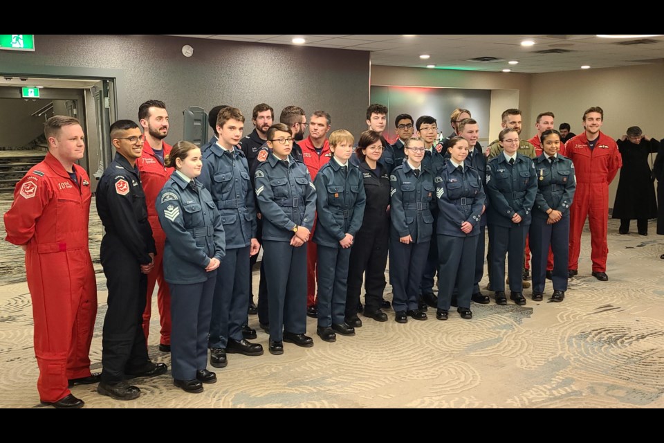 Snowbirds pilots and technicians with air cadets at the Nov. 24 Dinner with the Snowbirds