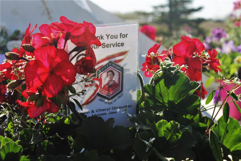 The collection of flowers are from Moose Jaw residents seeking to pay their respects to Capt. Jenn Casey, who died during a crash in B.C. on May 17. (photo by Larissa Kurz)