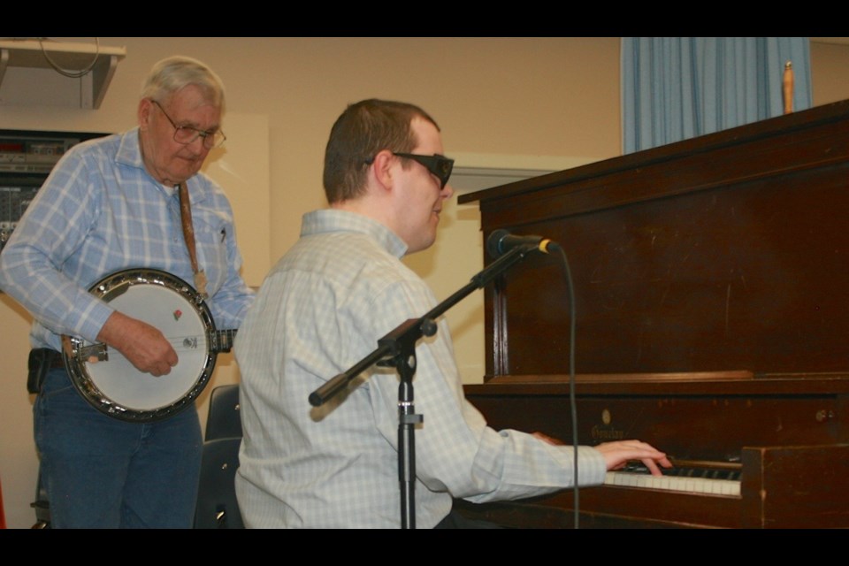 Kelly Sapergia and Ted McHolm (Photo by Ron Walter)