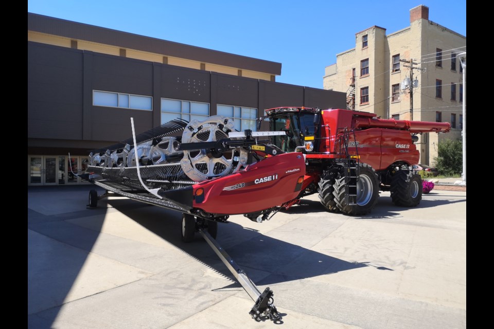 The latest Case IH 9250 Combine sold by Young’s Equipment Inc. is parked outside the Moose Jaw Events Centre on July 26, 2023