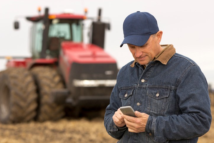farmer using smartphone getty images