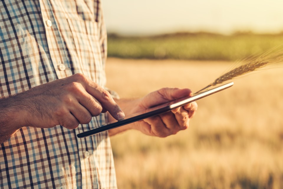 farmer with tablet shutterstock