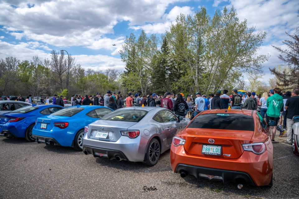 Four cars lined up for attendees to admire