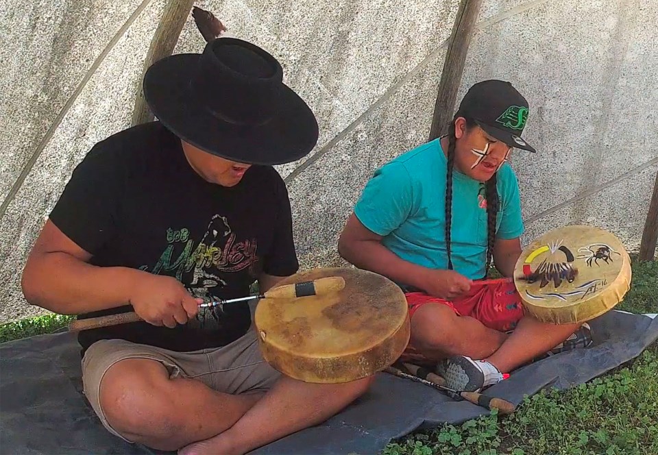 Dennis and Tiny Littletent hand drum