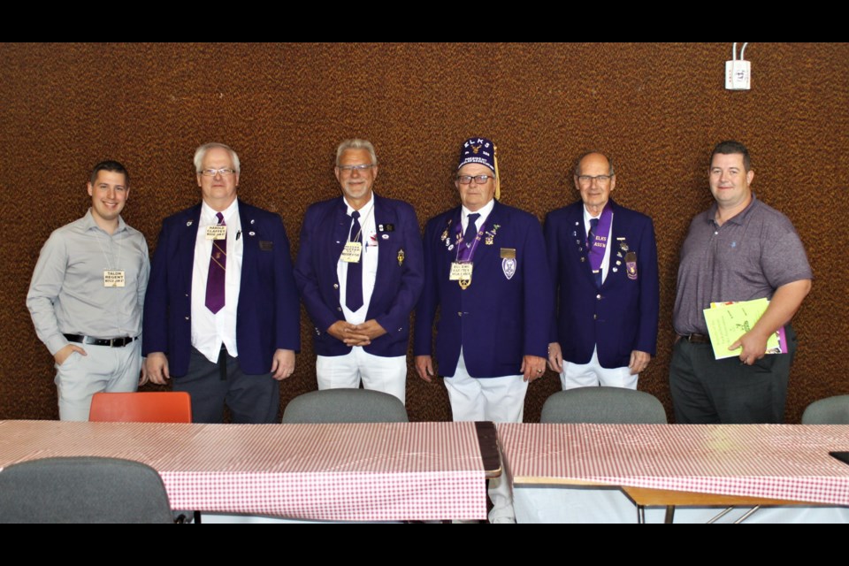 L-R: Talon Regent, chairman of the judiciary for the provincial Elks; Harold Claffey, provincial publicity director; Ron Potter, Grand Exalted Ruler; Eugene Hartter, current provincial president; Chris Svab, incoming provincial president; Kevan McBeth, executive director of Elks Canada.