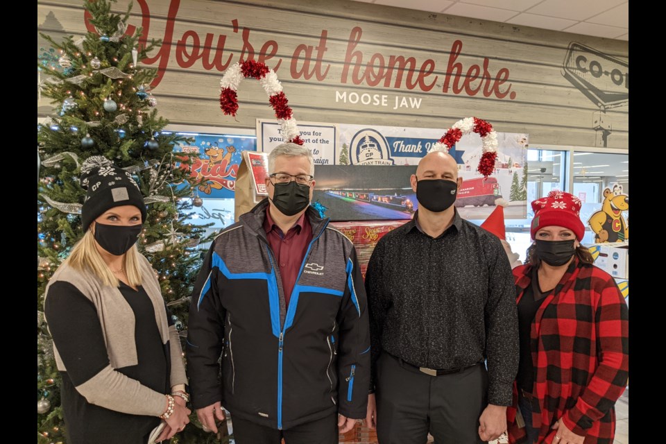 Michaela Turner, marketing and community relations manager at MJ Co-op; Darroch Cairns, general sales manager at Murray GM, which made a generous donation; Geoff Anderson, general manager at MJ Co-op; and Gabrielle Belanger, supervisor of support services at CP Rail Moose Jaw