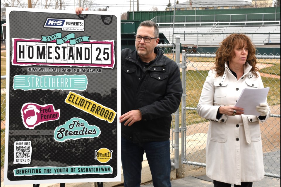 Representatives from River Street Promotions unveil the first wave lineup for Homestand ’25, set to take place at Ross Wells Park on Sept. 6. Laurie Kosior-Pappenfoot is on the right.