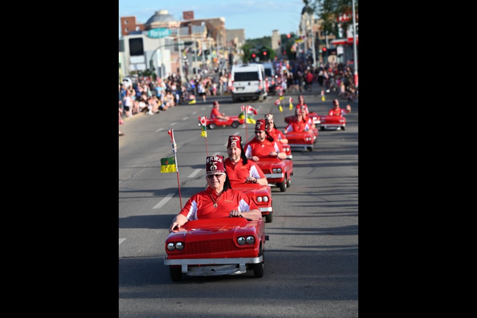 Members of the Shriners head up Main Street single file in 2022 in their iconic miniature cars - MJ Independent file photo 