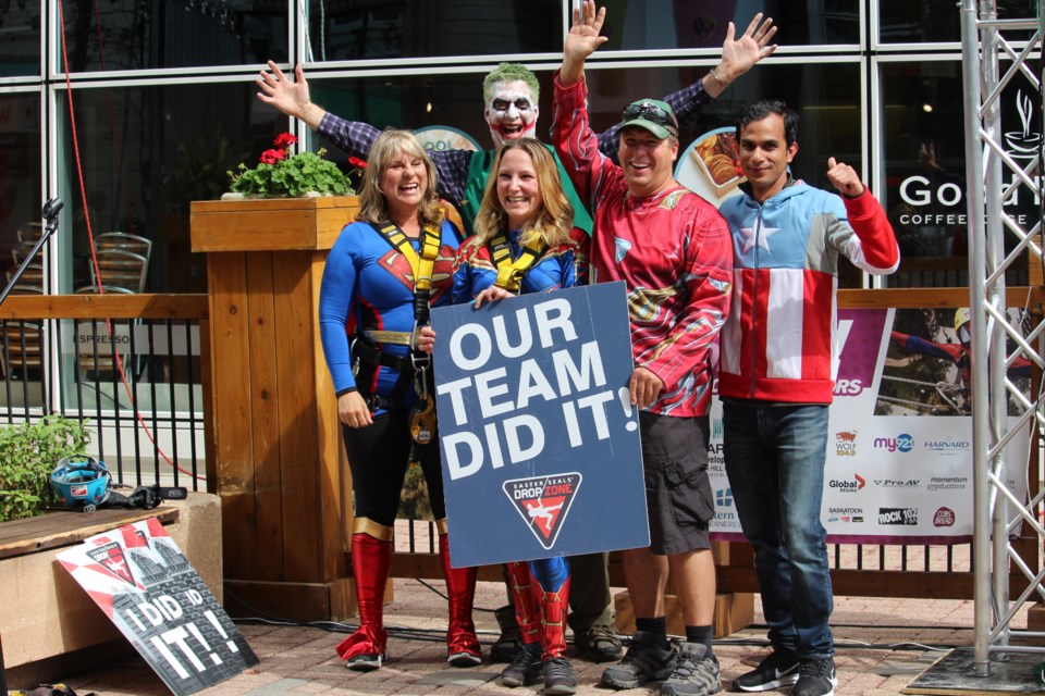 The Breakfast Club post-rappel, L-R: Roxanne Shandera, Pamela Clothier, Cory Csada, Abbas Ahmed, and Mark Fenton behind. (supplied)