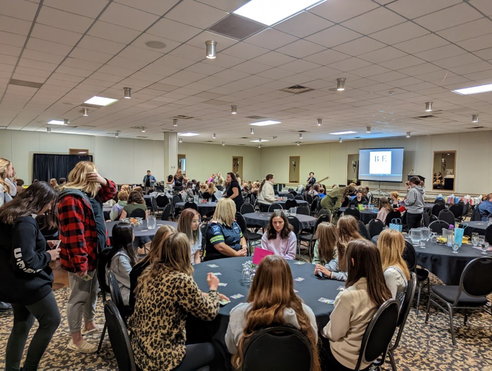 Jocelyn MacLeod, Jenn Angus, and Angela Sereda, the co-founders of the Tru-Unity Girls Leadership Program, welcome the first group of local