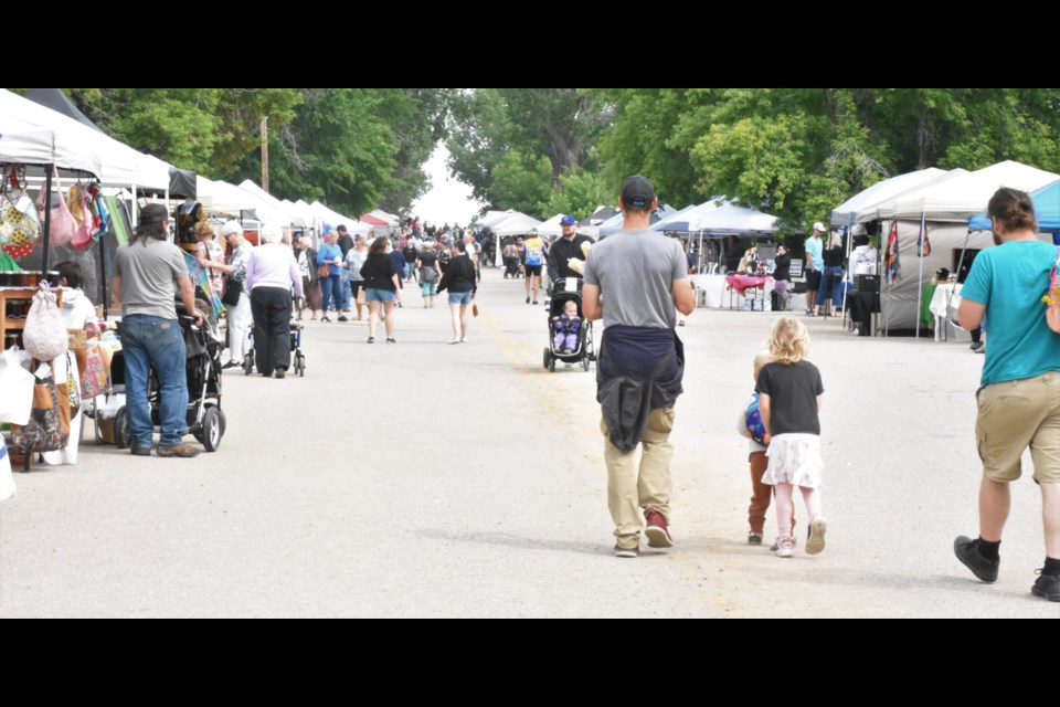 Thousands of people walked the main street of Mortlach during the 14th annual berry festival. Photo by Jason G. Antonio