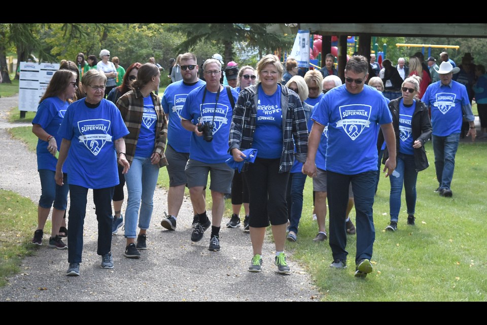 Participants in the 2019 Parkinson SuperWalk head out on their tour of the Wakamow Valley trails.