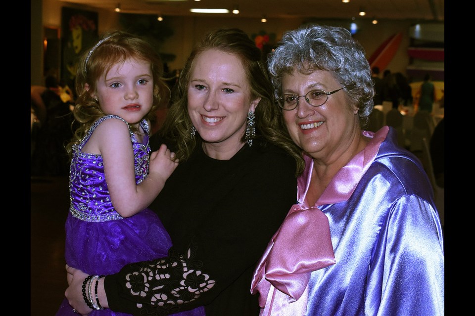 Elaine Crocker – right, as the Fairy Godmother – pauses for a photo with Briar and mom Terri-Lynn.