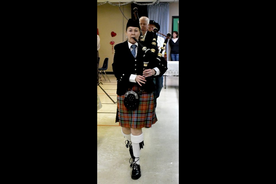 Michelle Gallagher pipes in the dignitaries at the start of the Robbie Burns Night festivities.