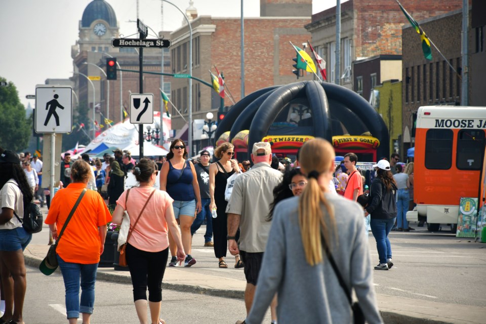 Festivalgoers fill Main Street North during Sidewalk Days in downtown Moose Jaw, which stretched across nine blocks and featured more than 240 vendors.