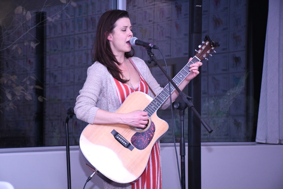 Regina musician Kara Golemba performed a blend of folk, roots and country music at the Moose Jaw Museum & Art Gallery before an opening ceremony to celebrate two new art installations. Photo by Jason G. Antonio