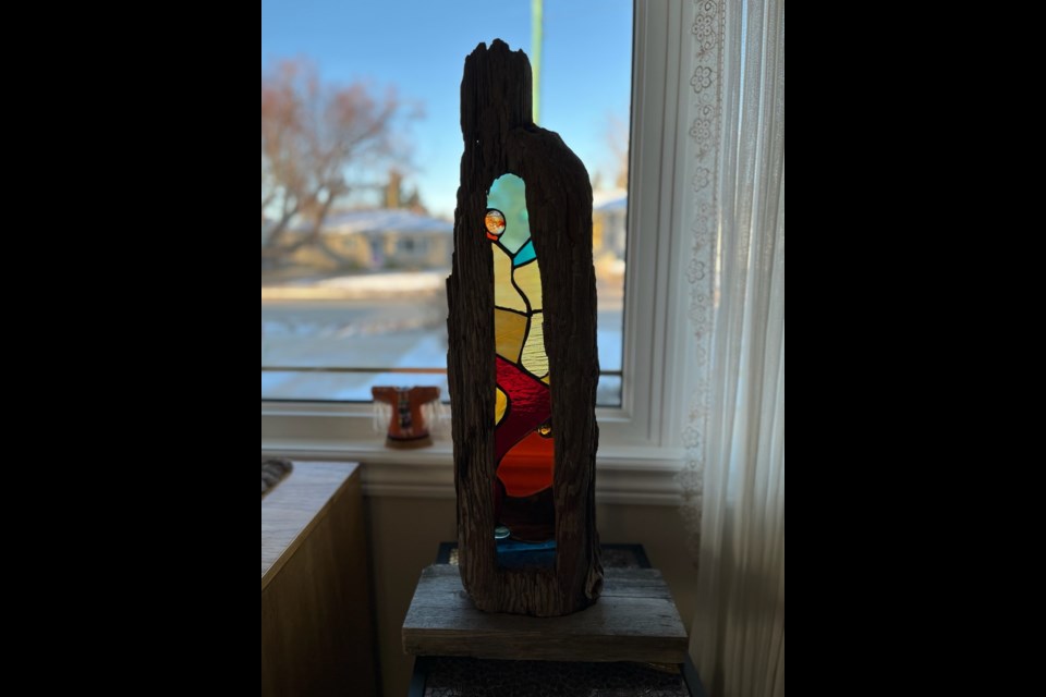 One of Hildebrandt's stained glass pieces from her driftwood collection. 