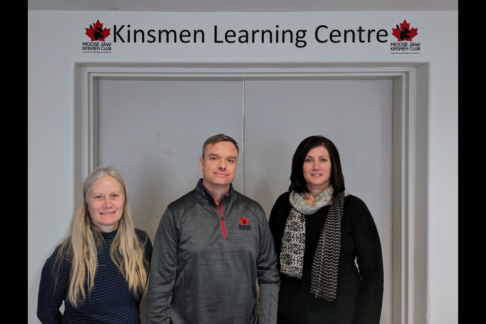 (l-r) Christy Schweiger, Cody Sharpe, and Jennifer McRorie outside the Kinsmen Learning Centre, where instructor Ward Schell was teaching an adult painting class