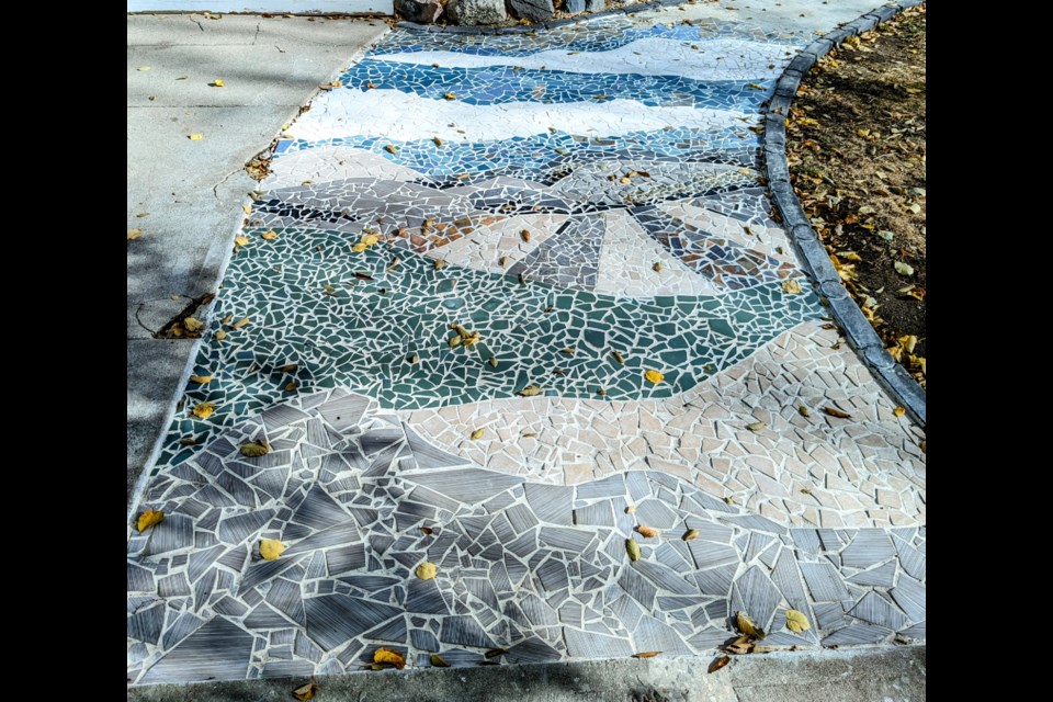The finished mosaic is a prairie landscape permanently brightening the Zimmerman's front yard