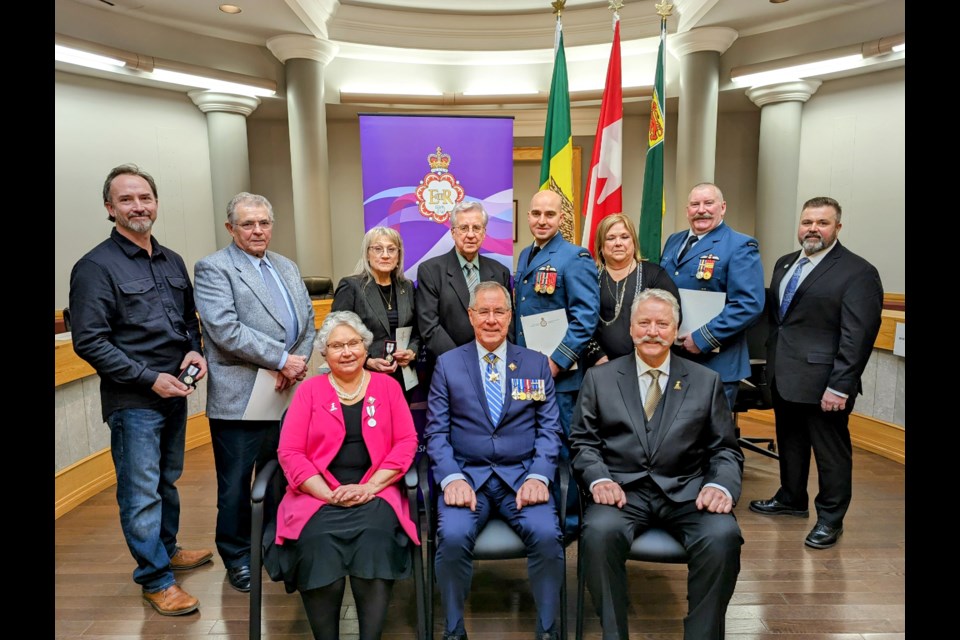 (Back row, l-r) Rion White, Andre Bouvier, Lucille Gilliland, Arthur Watson, Shant Kahvedjian, Renee Wilkinson, Marv Macauley, and Ted Moir. (Front row, l-r) Donna Mirasty, Russ Mirasty, Clive Tolley