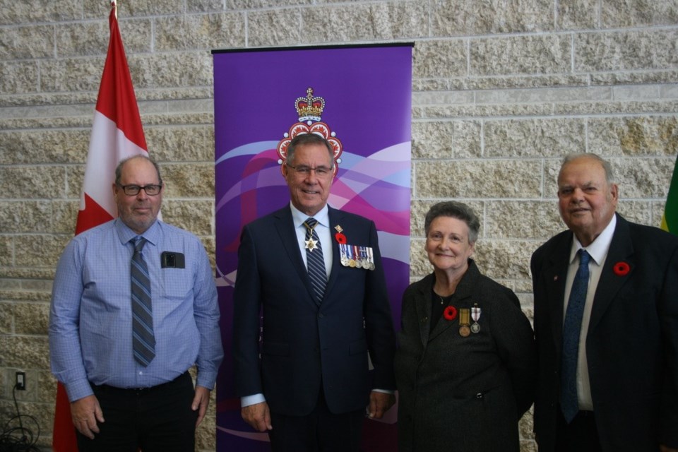 Lieut.-Gov. Russ Mirasty poses with Joyce and Ron Walter and their nephew Reg Dyck