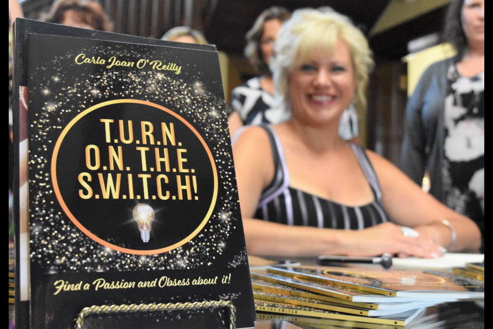 Author Carla O'Reilly unveiled her third book on mental health, T.U.R.N. O.N. T.H.E. S.W.I.T.C.H., during a book launch on Aug. 15 at Fifth Avenue Collection. Photo by Jason G. Antonio