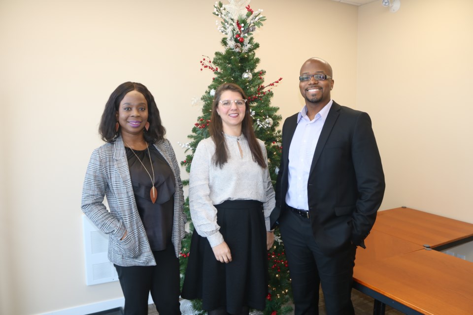 Bukola Afolabi, Amy Lunov and Dwight Cameron run their businesses out of the Diefenbaker Common Professional Building. Photo by Shawn Slaght