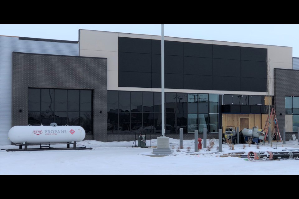 One of several new buildings under construction to the east of Canadian Tire. This one will likely hold Winners. Photo by Jason G. Antonio 