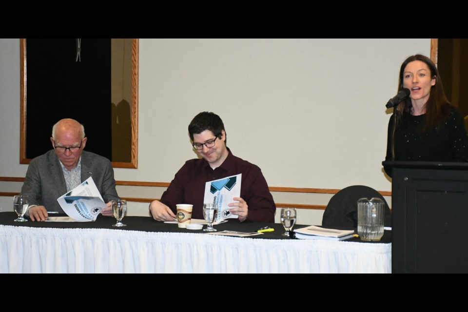 Kristy Van Slyck (right) facilitates a discussion about property assessments during a forum hosted by the chamber of commerce. Also pictured are property manager Rod Van Slyck, owner of Viridian Property Corporation, and Ryan Simpson with Altas Group. Photo by Jason G. Antonio 