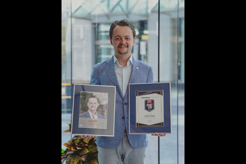 Moose Javian Connor Chow holds two national awards he recently received from different insurance and construction organizations. Photo courtesy Connor Chow