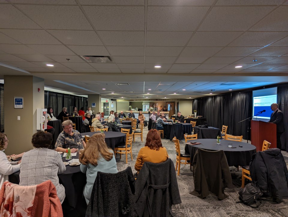 Downtown Moose Jaw Association chair Geoff Anderson gives a presentation to the March 8 Open House guests at Mosaic Place