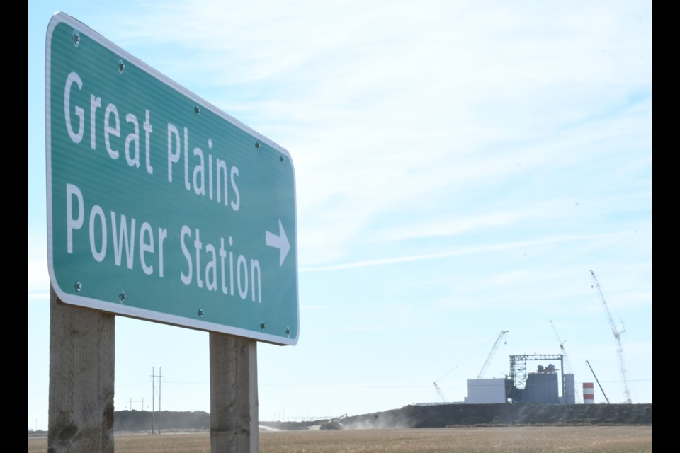 A sign on an eastbound grid road points to the Great Plains Power Station. Photo by Jason G. Antonio 