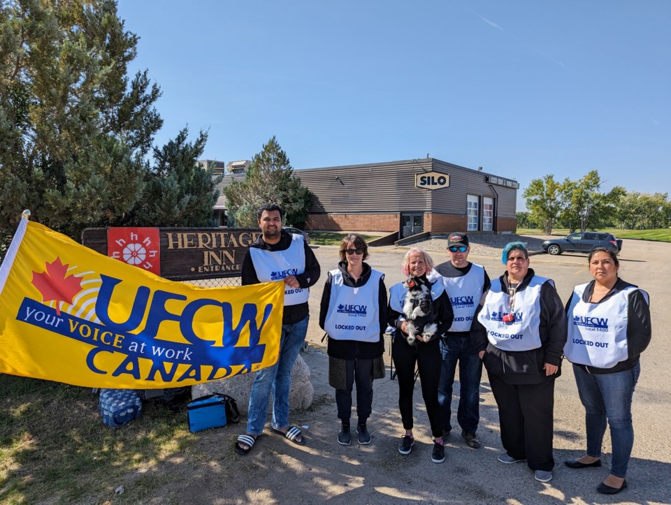 holiday-inn-staff-along-with-supporters-from-their-union-walk-picket-lines-following-a-lockout-by-their-employer