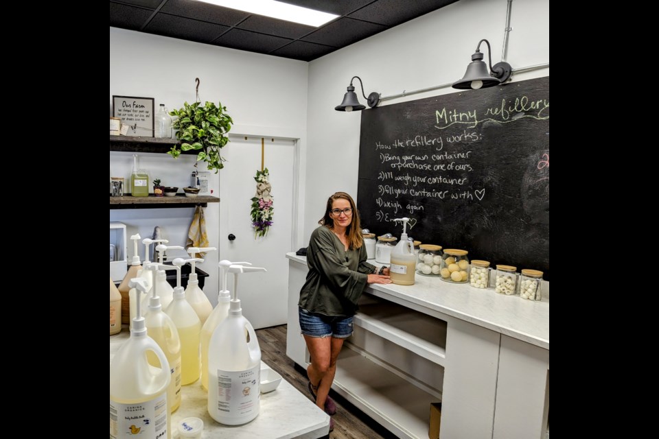 Laurie Hysuick stands at the refilling station of her refillery in the Old CPR Station on Manitoba in downtown Moose Jaw