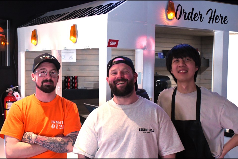 From left to right: Vincent, owner Kyle Forrest, and Weid.