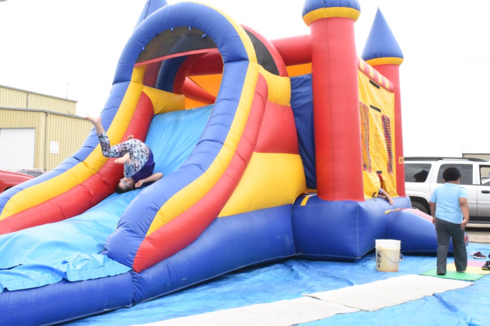 A bouncy castle was at Fountain Tire on Aug. 30 as the company held a customer appreciation event featuring pancakes and sausages. Photo by Jason G. Antonio