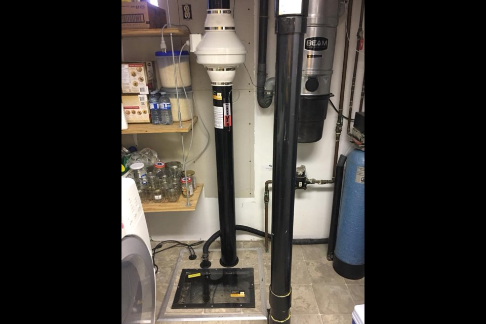 A radon mitigation system installed by Master Radon, designed to continuously vent air from an air pocket under the foundation, reducing pressure