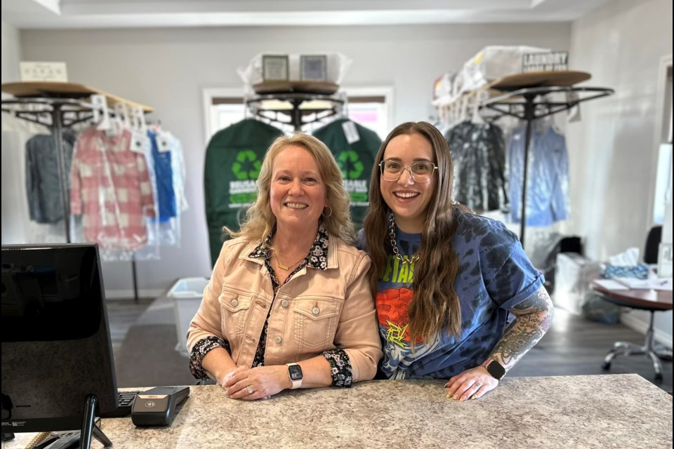 The previous owner of Kwala-T Cleaners, Shelly Evans (left) stands next to her daughter, Marissa Hann (right), the owner of Revive Garment Care.