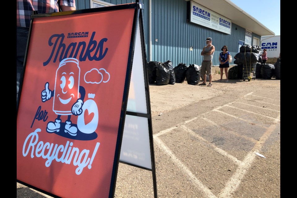 Since reopening in June, the SARCAN depot in Moose Jaw has seen daily lineups where customers have to wait up to 1.5 hours to get inside. Photo by Jason G. Antonio 