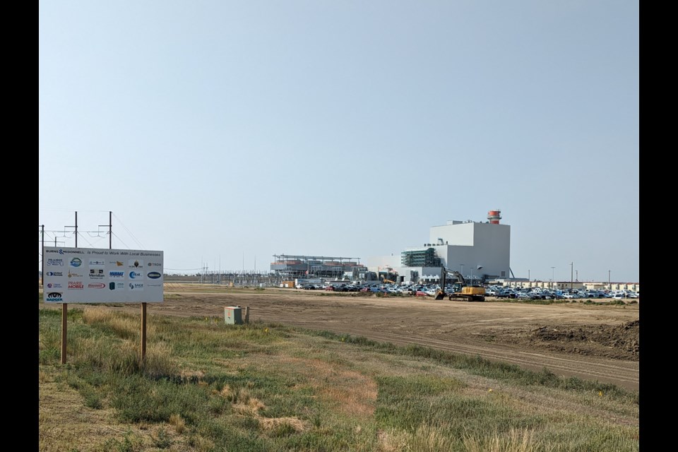 The growing completeness of the gas-powered 360 MW facility is reflected in this Aug. 2023 skyline photo