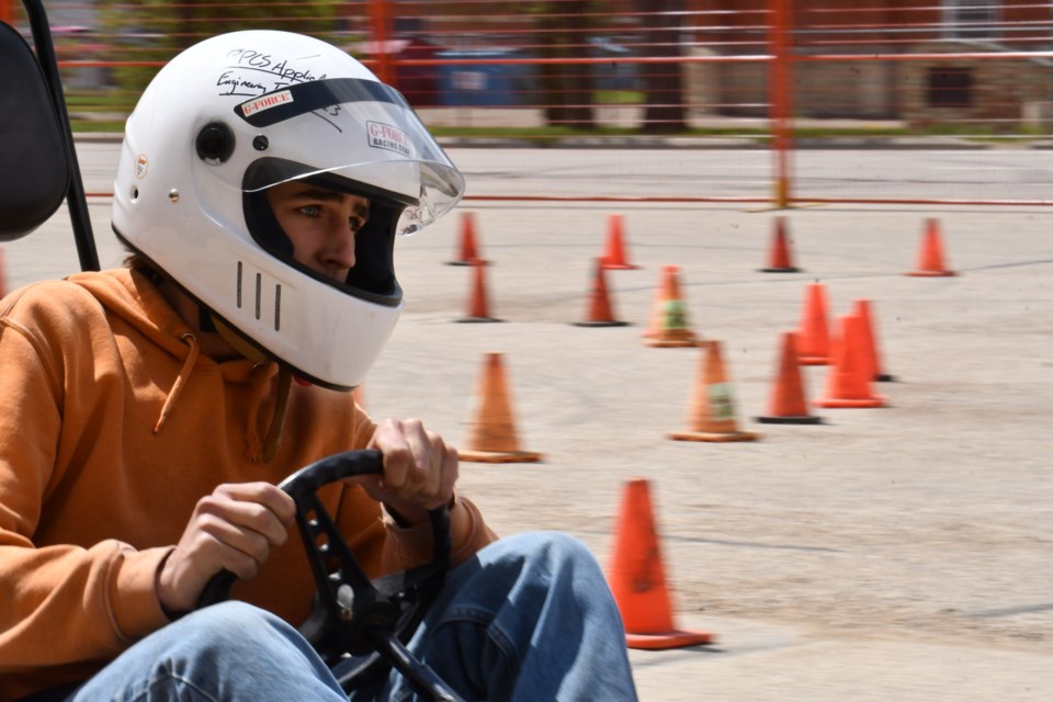 A few scenes from the Swervin’ Mini Indy "Race for Recovery" event held in the west parking lot of the Town 'N' Country Mall this month.