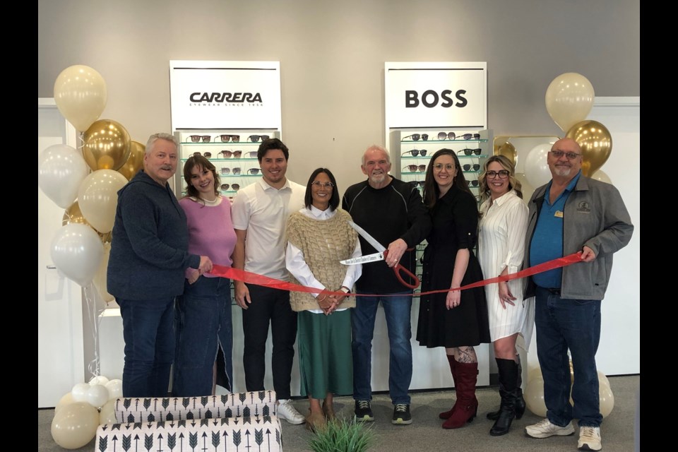 (l-r): Mayor Clive Tolley, Annie MacPherson, Braven MacPherson, Loree MacPherson, Rob Clark, Allyson Angus, Arlene Miller, and Doug Blanc, standing ready to cut the ribbon

