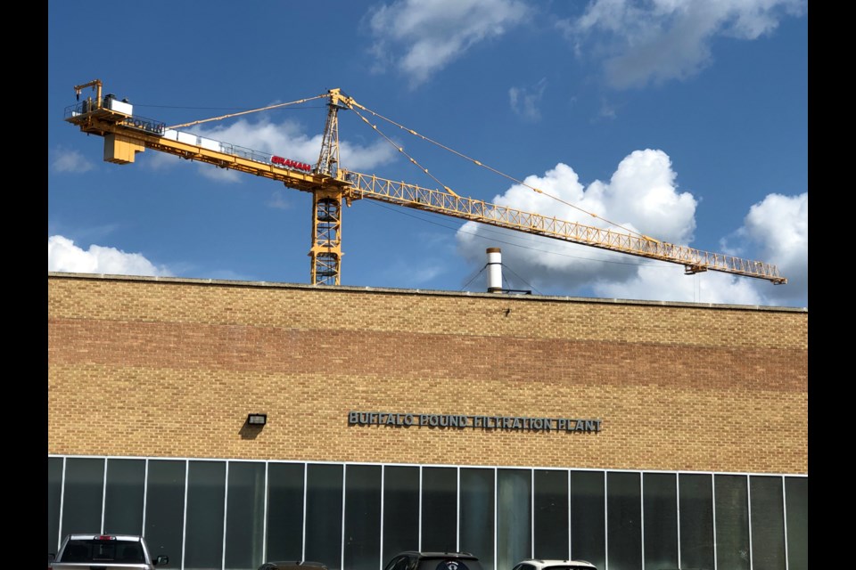 The crane is noticeable upon entering the front doors of the plant. Photo by Jason G. Antonio