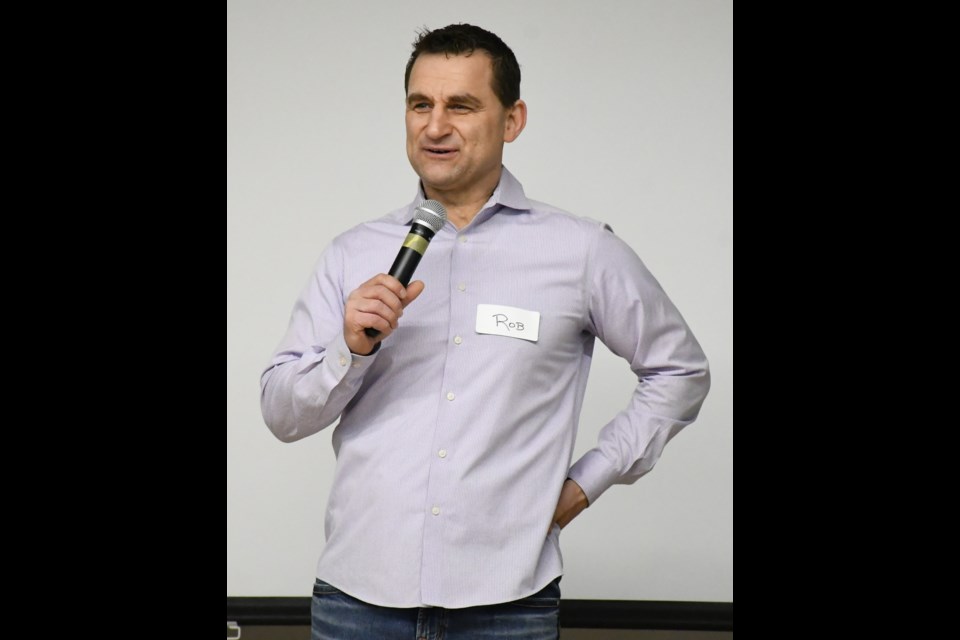 Pastor Rob Reimer speaks during the chili supper. Photo by Jason G. Antonio 