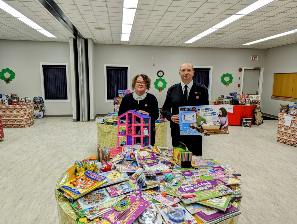 sa-lieutenants-almeta-and-lester-ward-stand-in-the-toy-store-area-off-the-lobby