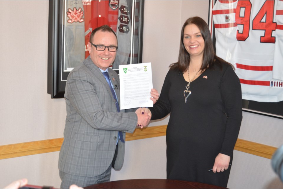 Moose Jaw Mayor Fraser Tolmie and Stor-Elvdal Deputy Mayor Linda Otnes Henriksen signed a “mooserandum of understanding” Wednesday. (Matthew Gourlie photograph)