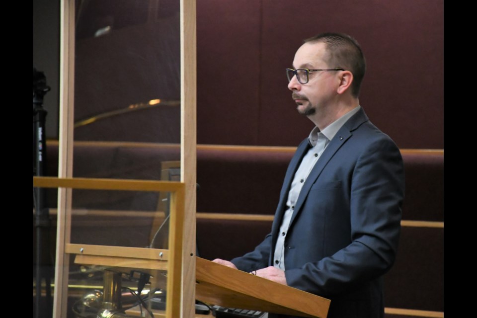 Mike Bachiu, chair of the special needs advisory committee, speaks to city council on April 26. Photo by Jason G. Antonio 